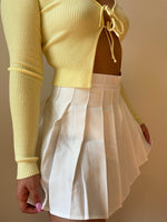 White pleated skirt