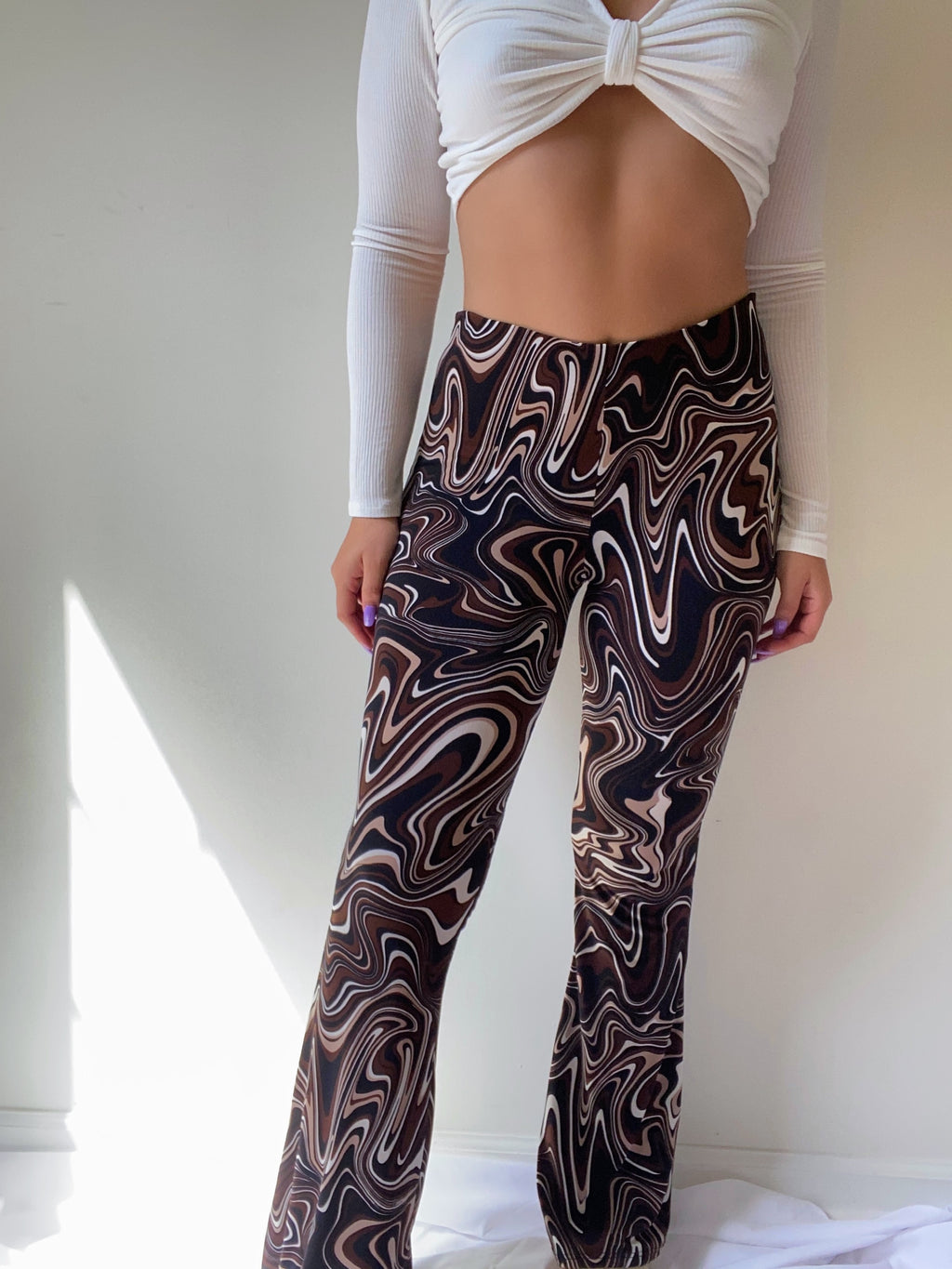 Brown swirl flare pants