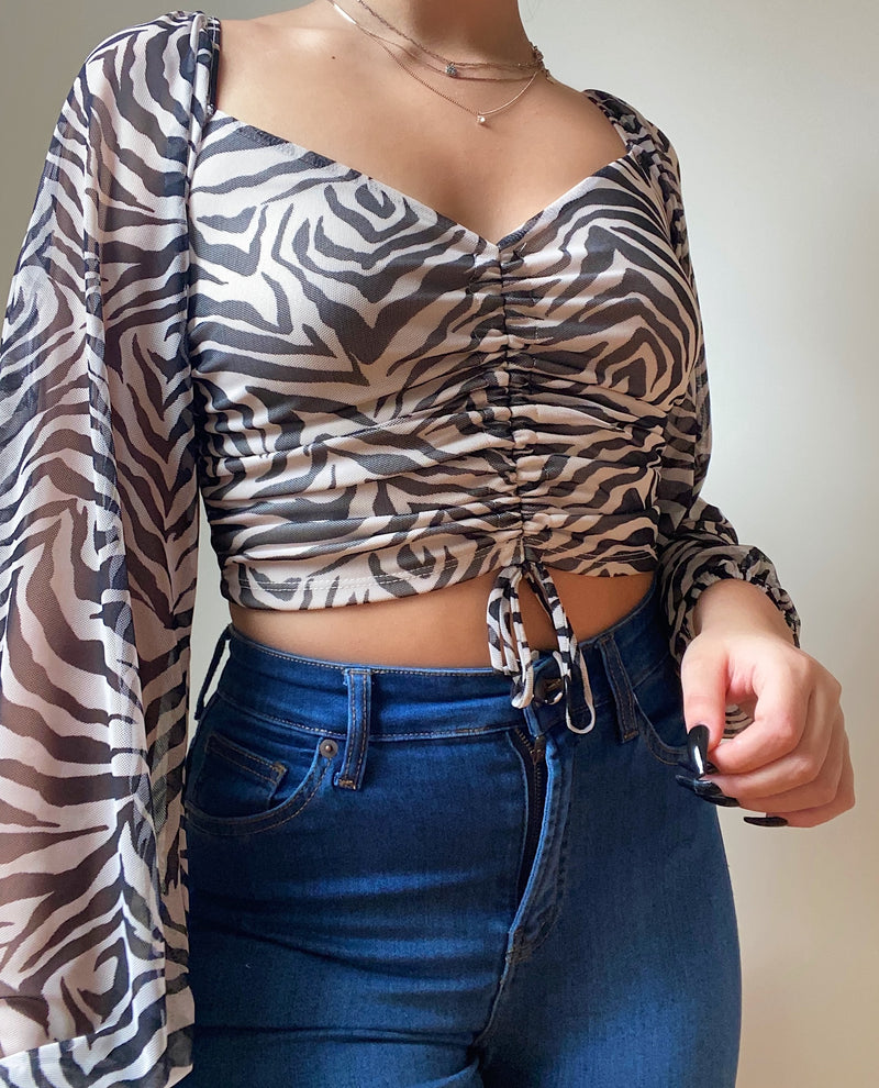 Becca long sleeve mesh animal print top