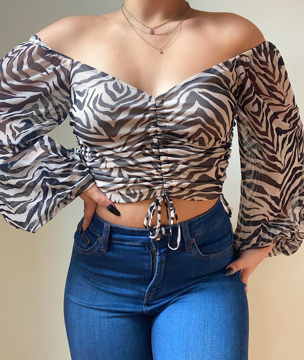 Becca long sleeve mesh animal print top